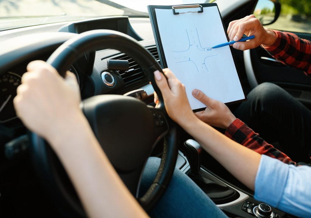 woman-and-man-with-checklist-driving-school.jpg